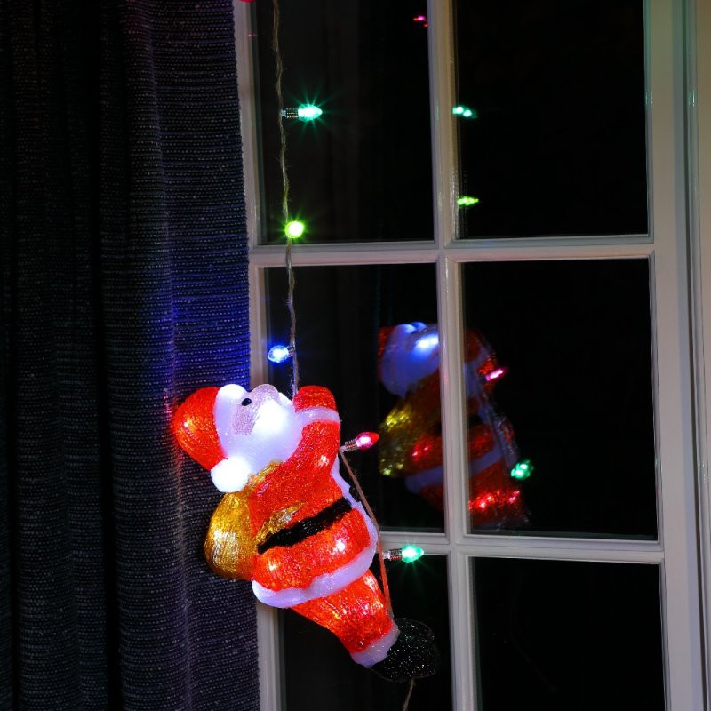 30CM ACRYLIC CLIMBING SANTA WITH STRING LIGHTS photo