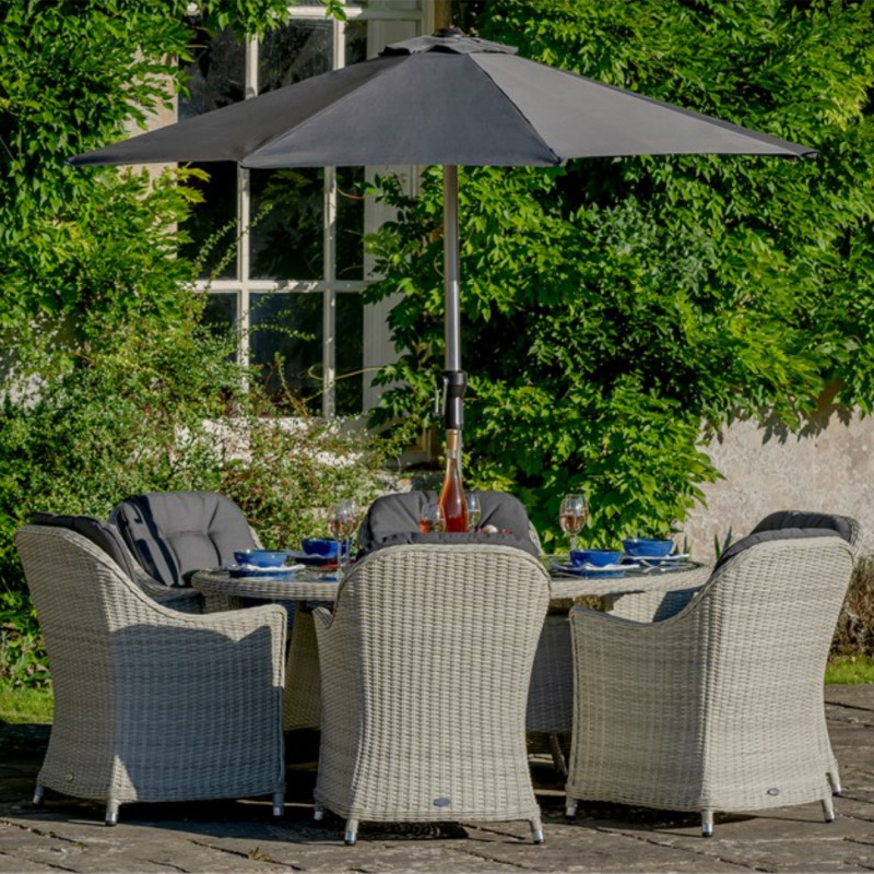 Bramblecrest Monterey Dove Grey 175 x 120cm Elliptical Table with 6 Armchairs & Parasol & Base