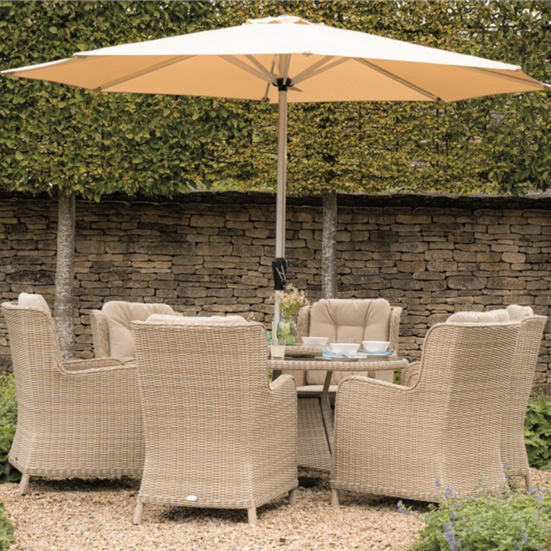 Bramblecrest Chedworth Sandstone 140cm Round Table with 60cm Lazy Susan, 6 High-Back Armchairs, Parasol & Base