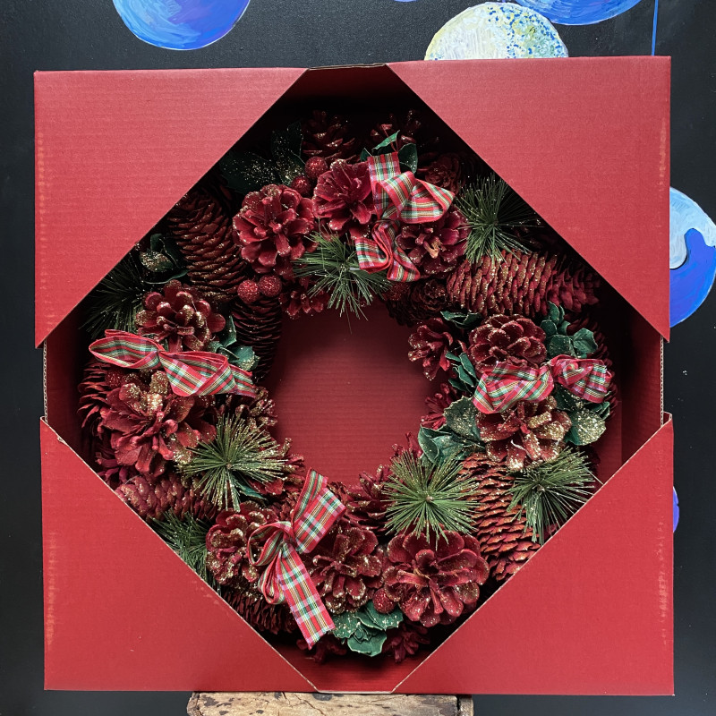 Red and Green Artificial Christmas Wreath With Ribbon photo