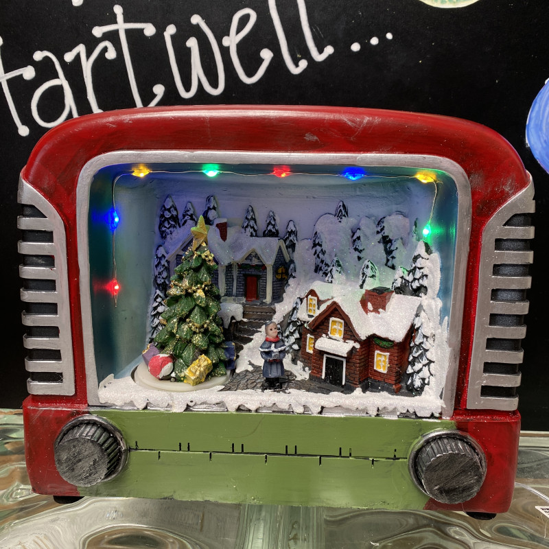 Illuminated Christmas Scene with Movement and Music photo
