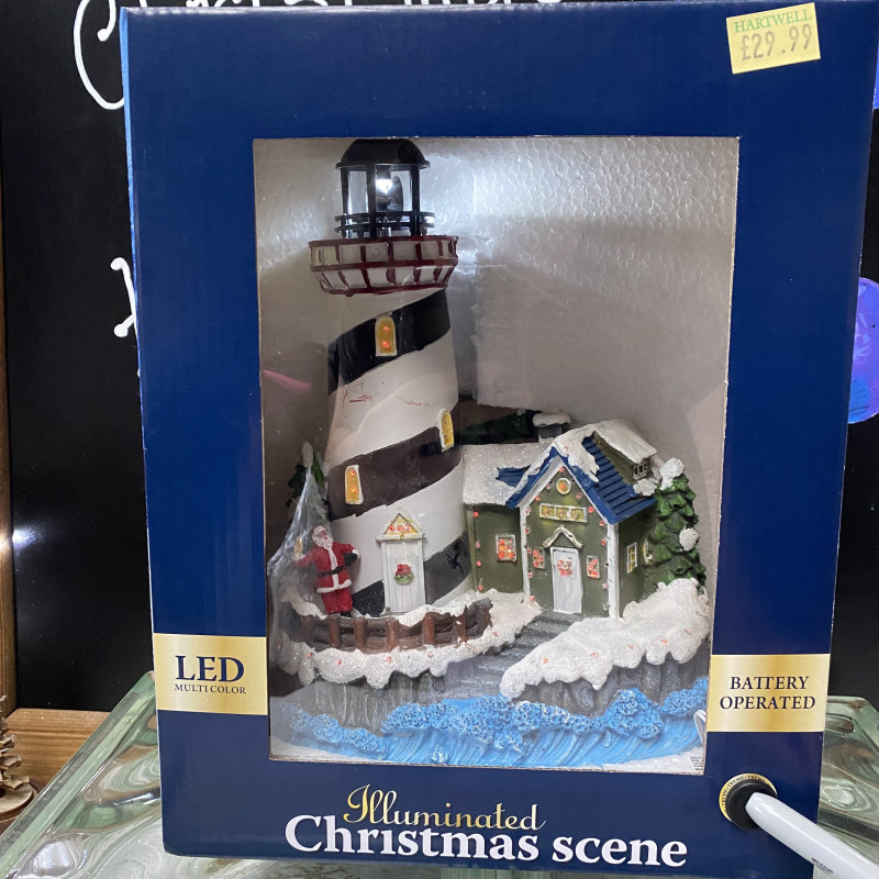 Lighthouse Illuminated Christmas Scene photo